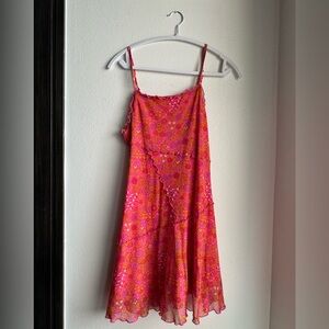 hot pink dress with colegio flower details and ruffles